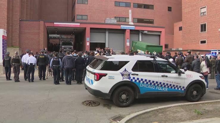1 officer dead, another critically injured in shooting at North Side hospital; suspect in custody