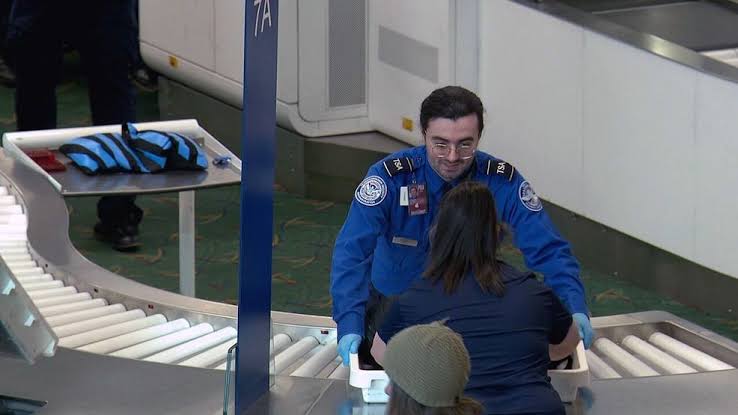 Portland International Airport TSA workers sleep in cars as they await pay on Monday