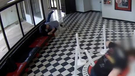 Oklahoma principal shot while tackling ex-student armed with handguns