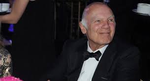 Real estate titan compares 'tax the rich' slogan to racial slurs