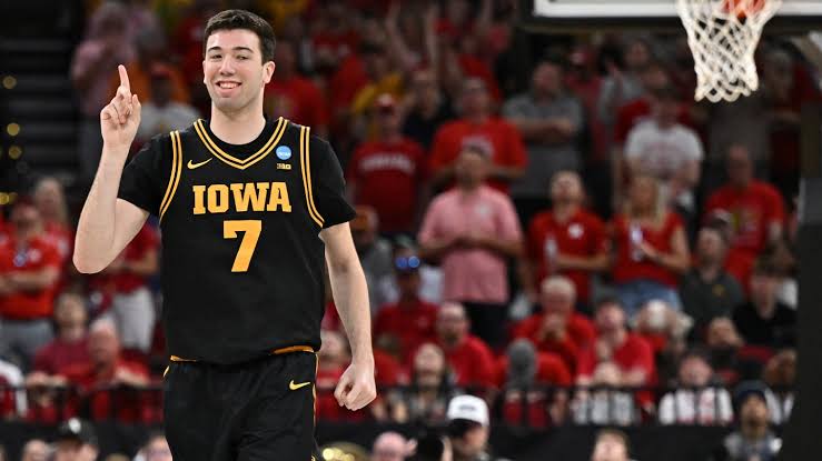 Ninth-seeded Iowa continues improbable March run, beating Nebraska 77-71 to reach Elite Eight