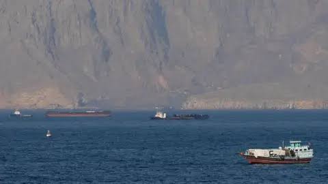 Strait of Hormuz closed again, Iran says, as ships attacked