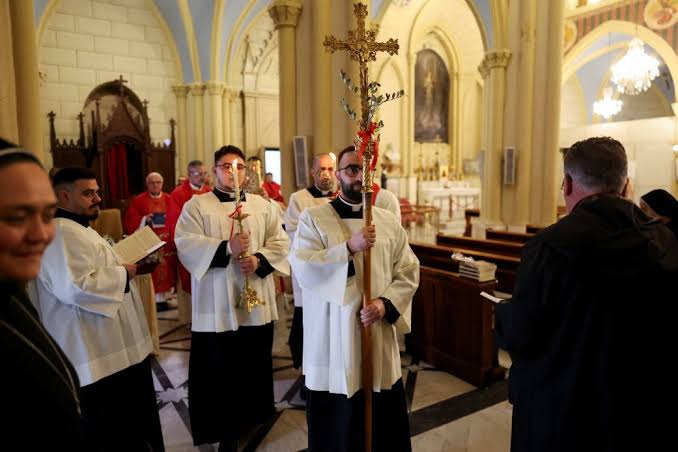 Israel reverses course after barring Palm Sunday Mass in Jerusalem