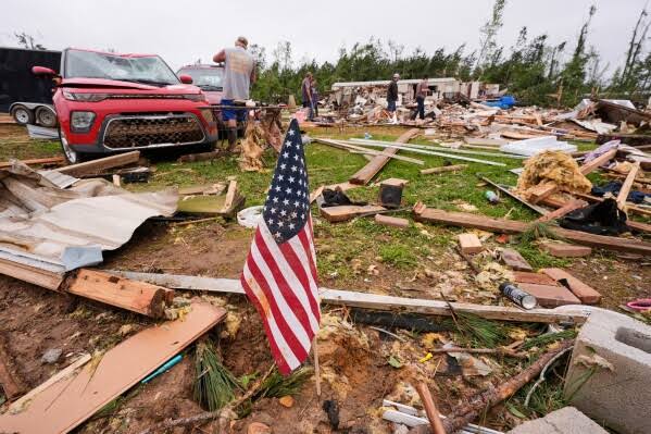 A faint meow in the rubble of a Mississippi tornado leads to a stunning rescue