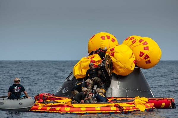 After Splashdown, Bring in the Navy Divers