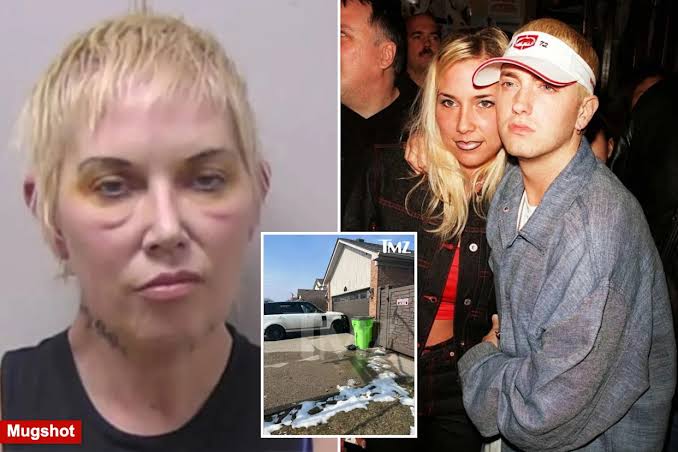 Eminem’s ex-wife looks rough in mug shot after DUI crash that launched parked car