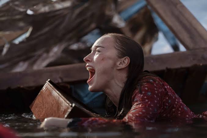 ‘Thrash’ Review: It’s Netflix and Chomp, as Phoebe Dynevor Stars in a Familiar but Gruesomely Competent Shark Thriller