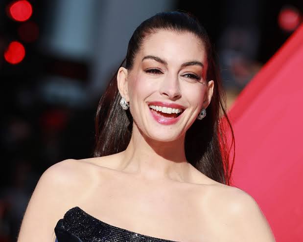 Anne Hathaway Stuns in a Strapless Velvet Gown With a Sheer Corset and a Sparkling Bustier Top