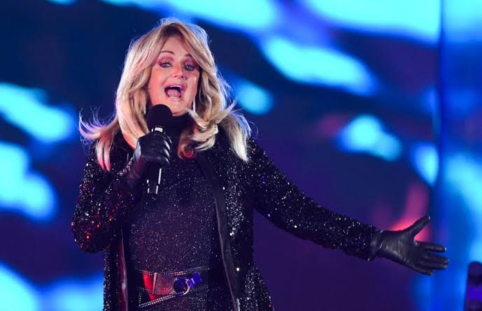 Legendary singer put into medically induced coma after emergency surgery