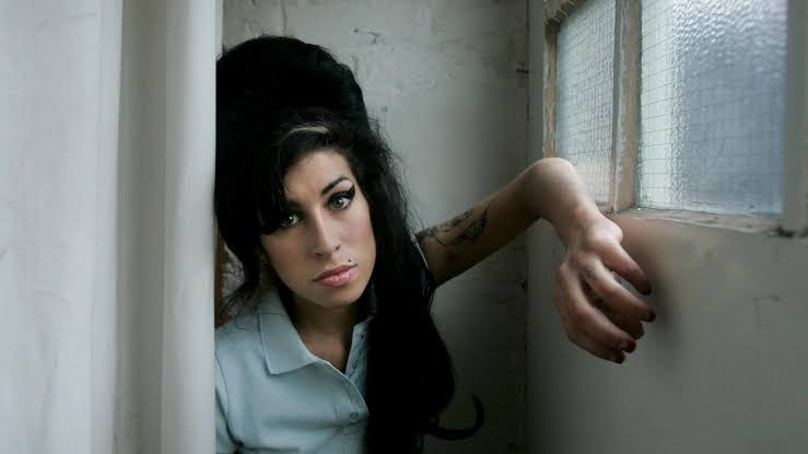 Amy Winehouse's father loses legal bid for funds friends made selling singer's memorabilia