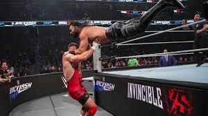 Photos: Rollins and Breakker clash in bitter battle