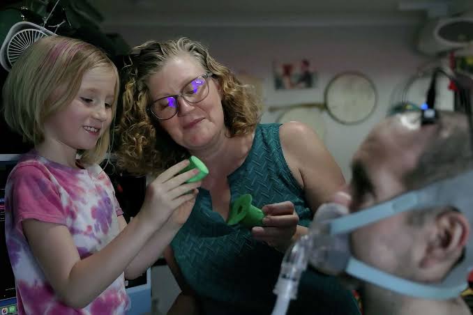 ALS took his voice. A brain implant helped him speak to his daughter again