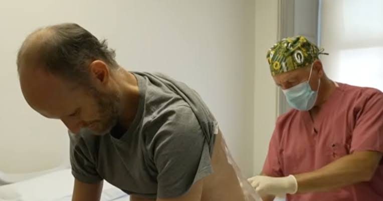 Scientist whose mother and sisters died of ALS complications hopes experimental treatment will save his life