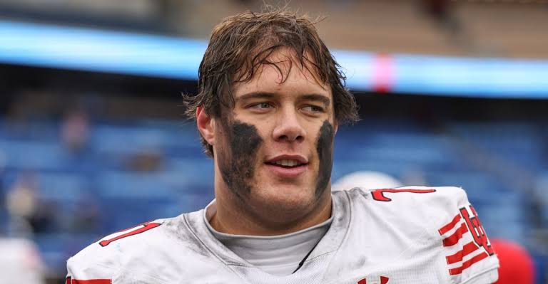 Instant grades for the Patriots drafting OT Caleb Lomu in Round 1