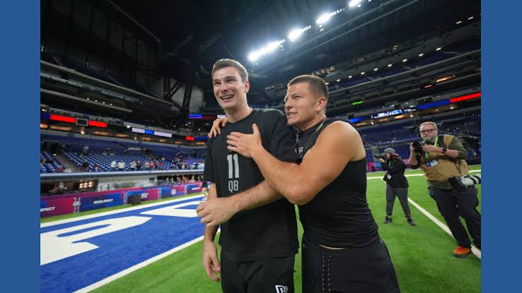 Heisman runner-up Pavia agrees to sign with the Ravens as an undrafted free agent, an AP source says