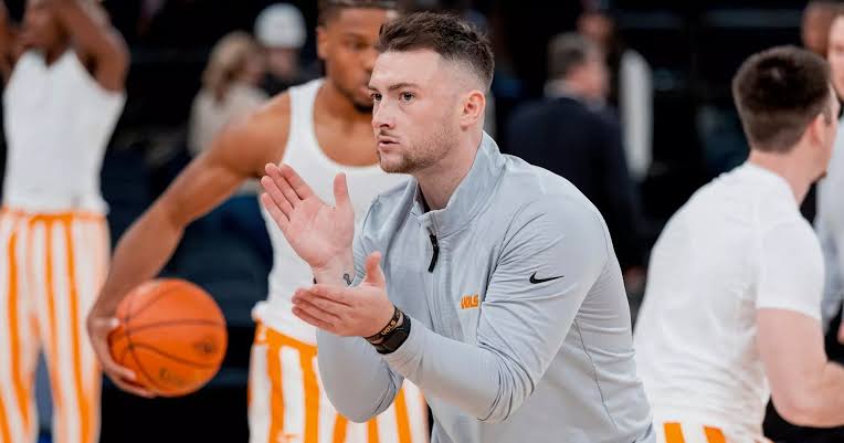 Tennessee staff member following Justin Gainey to North Carolina State