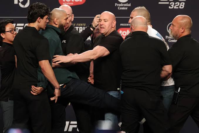 Khamzat Chimaev kicks Sean Strickland in wild scene at UFC 328 press conference