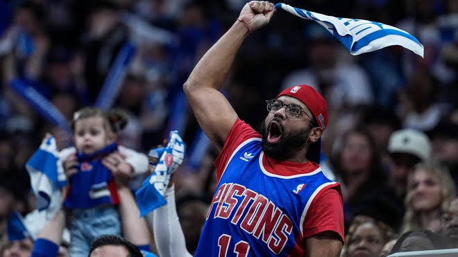 Detroit Pistons fans ditch free T-shirts, show off their playoff swag