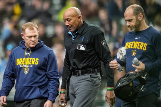 MLB umpire leaves the game after taking foul ball to the face