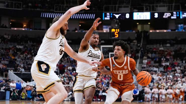 Texas' Jordan Pope says he played with broken foot vs. Purdue