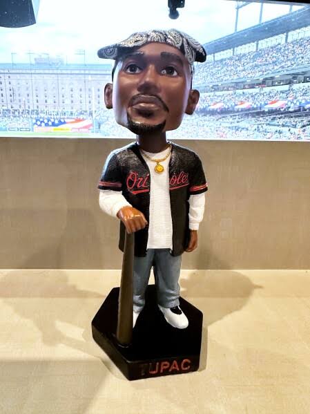 Orioles hold Tupac Shakur bobblehead promotion, and his sister throws out the ceremonial first pitch