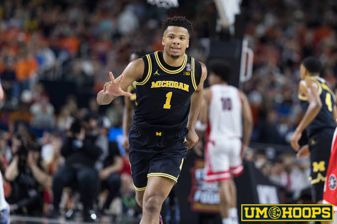 Trey McKenney signs to return to Michigan for sophomore season