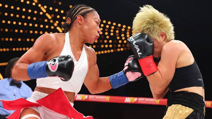 Baumgardner retains unified crown; Green carted off in upset loss