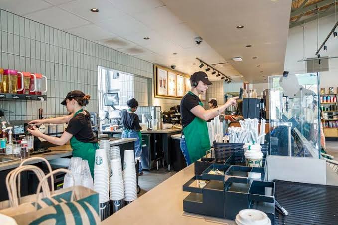 Starbucks Now Offering Baristas Up To $1,200 In Bonuses—And Weekly Paychecks