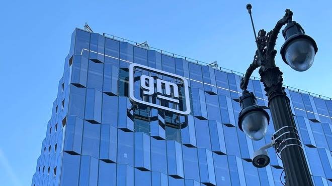 GM cutting up to 600 white-collar jobs, even as it seeks tech talent