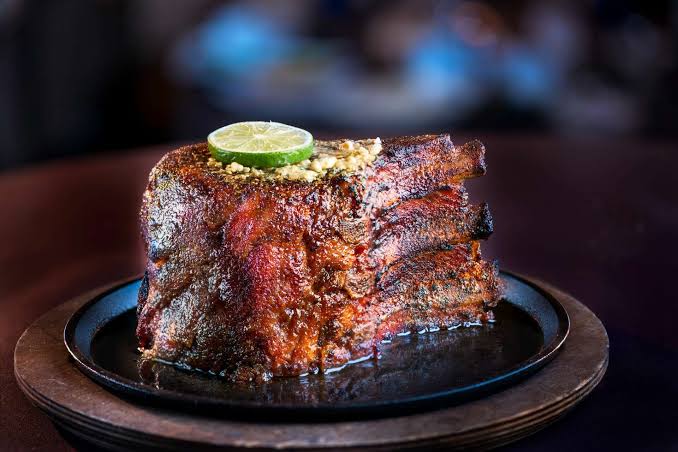 Judge slams Texas steakhouse with $21M judgment over illegal tip pool