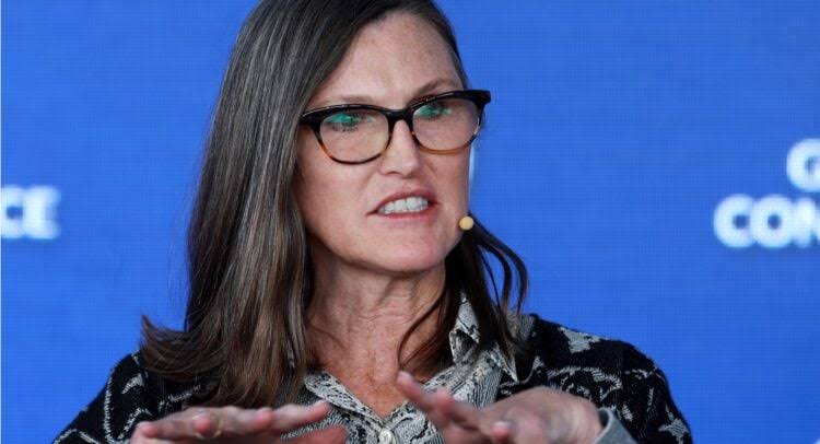 Cathie Wood Defies Market Trends, Buys Robinhood and Tesla Shares amid Slump