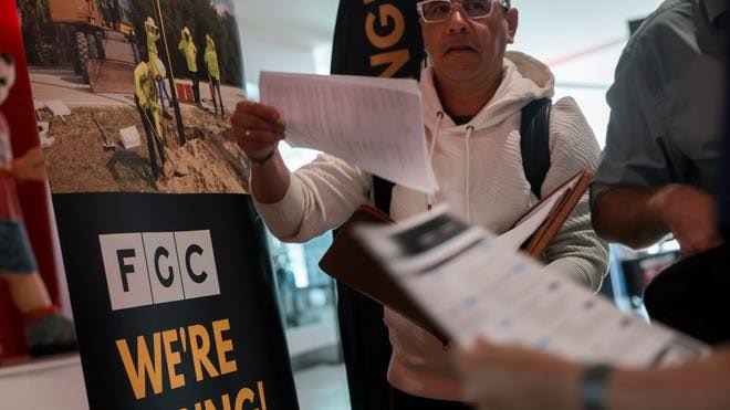 US added 115,000 jobs in April, fueling cautious optimism about hiring