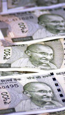 India Unleashes Curbs on Rupee Bets as Intervention Costs Swell