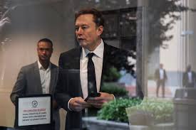 Elon Musk, Apple's Cook and Boeing CEO going to China with Trump, official says