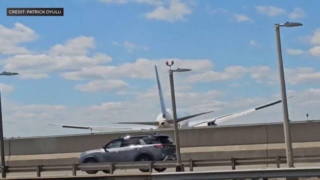 United flight landing at Newark Liberty Airport strikes light pole, truck on New Jersey Turnpike, officials say