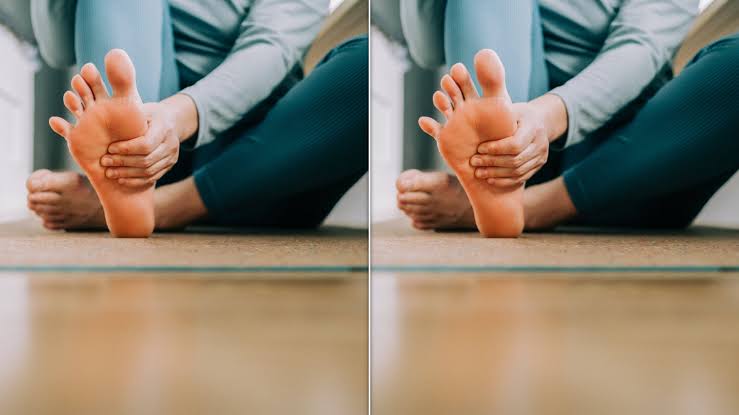 What Having Flat Feet Really Means For Your Health, According To Experts