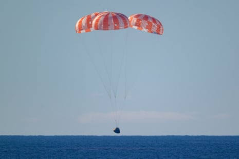 Jubilant return of Artemis II shadowed by ‘extinction-level’ cuts to Nasa: ‘It’s discordant’