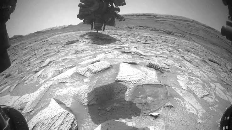 Watch NASA's Curiosity rover 'struggle' to remove a rock that got stuck on its robotic arm for nearly a week