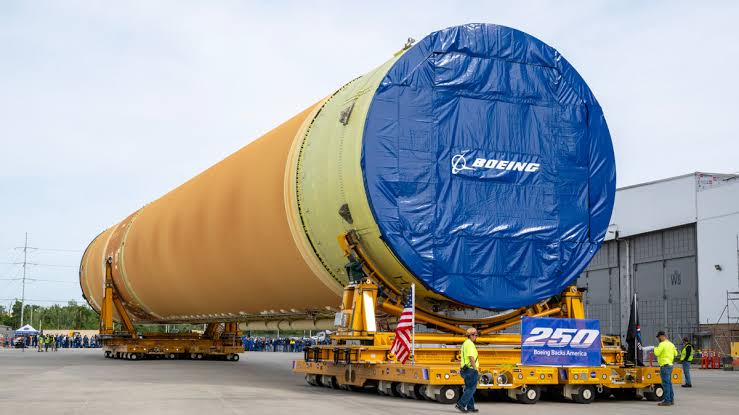 Artemis III moon rocket rolls out of factory onto barge