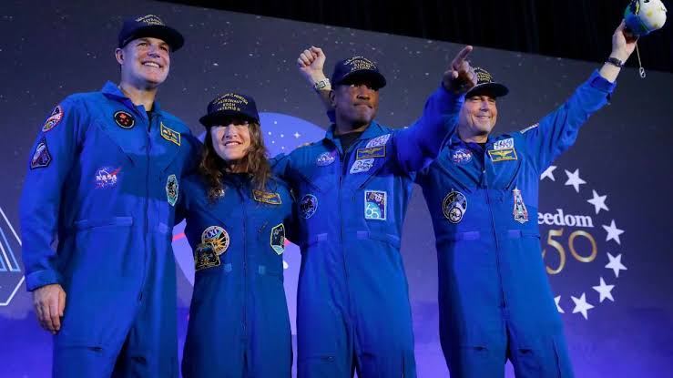 Artemis II's moon-traveling astronauts return home to cheers after a record-breaking trip