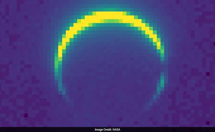 NASA's Psyche Spacecraft Captures Rare Crescent Image Of Mars During Flyby