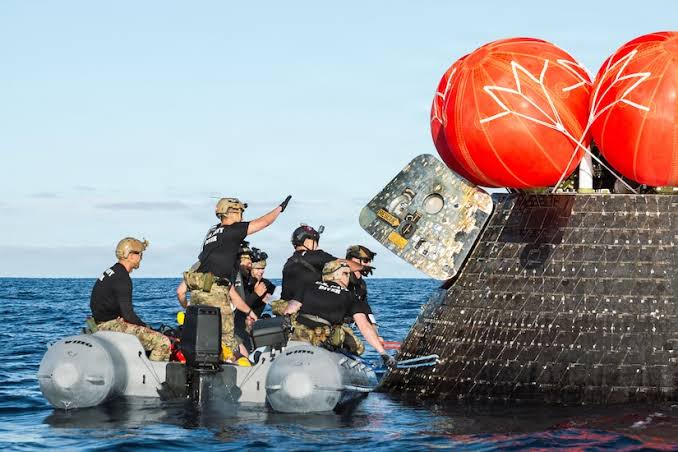 Navy Dive Medical Recovery Team Provides Initial Care to Artemis II Crew