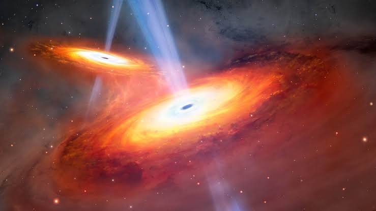 Two blazing quasars caught waltzing into a merger