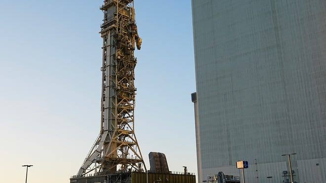 NASA's giant crawler moves launch tower to prep for Artemis III moon mission