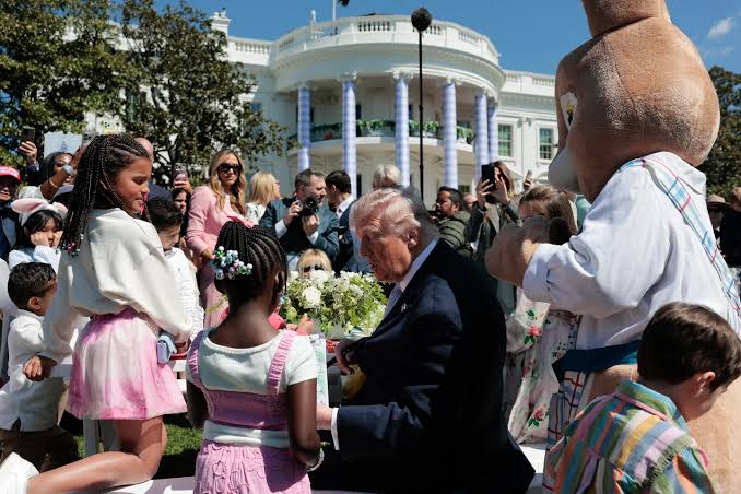 At White House Easter Egg Roll, Trump tells the children about the war