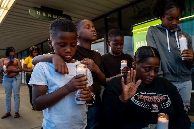 Relatives of mass shooting victims in Louisiana pray for end to domestic violence