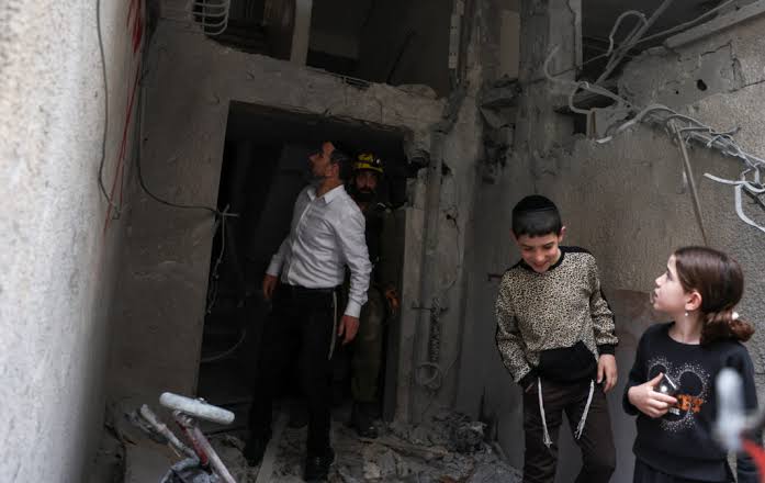 Iran fires on Israel and Gulf neighbors as Trump claims threat from Tehran nearly eliminated