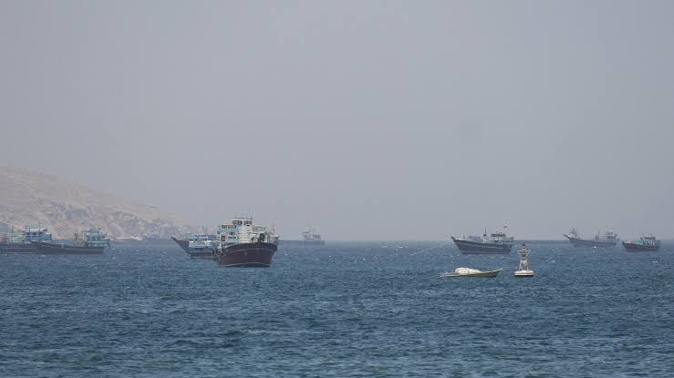 US says it sinks Iranian small boats, shoots down missiles, drones as it opens Strait