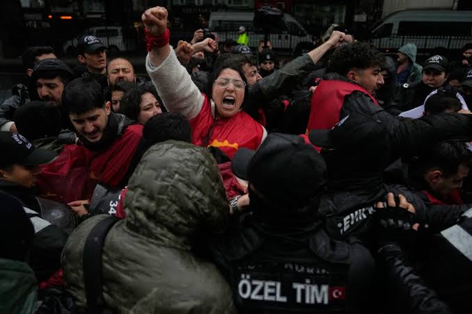 Workers around the world demonstrate on May Day, in photos